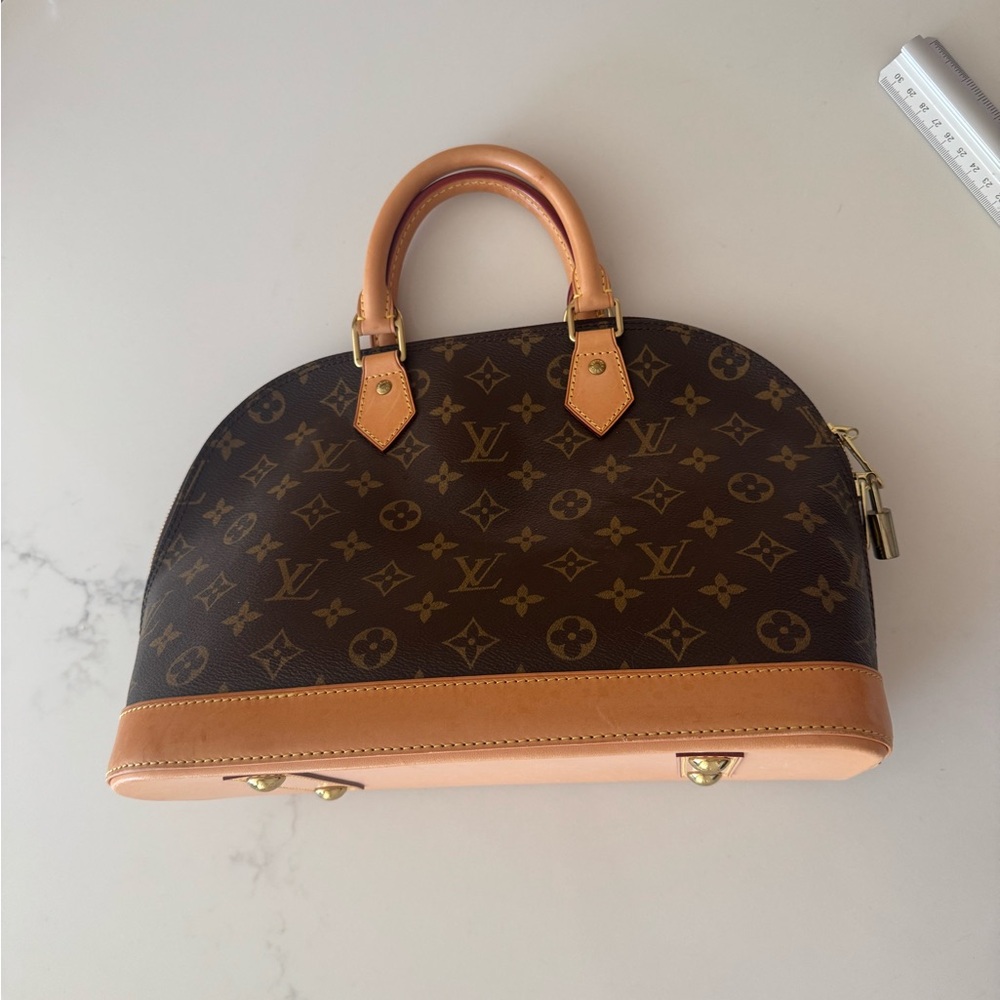 Louis Vuitton Brown Monogram Alma Satchel with Natural Vachetta Trim